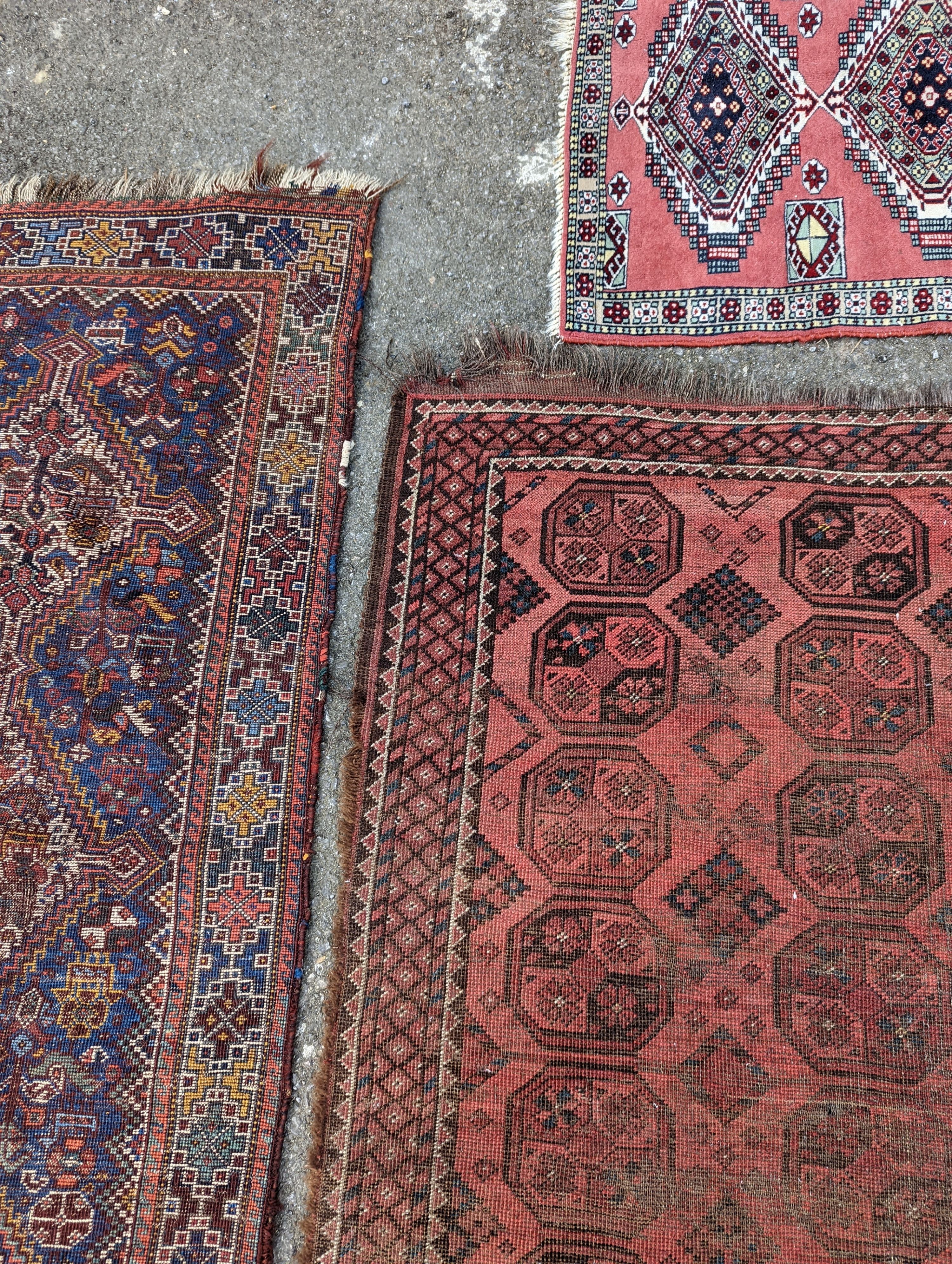 A North West Persian blue ground runner, 300 x 109 (worn and holed) a North West Persian rug, Bohara rug and mat